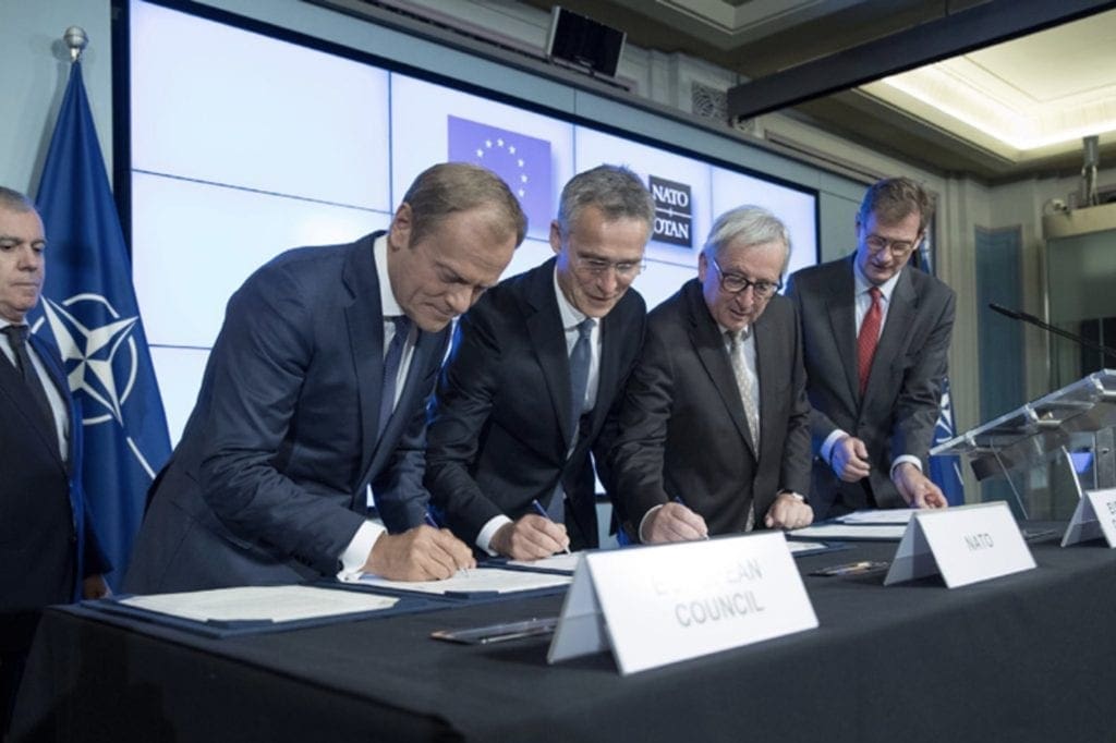 Figure 2. Photo of signing ceremony for joint EU-NATO declaration, Warsaw, 2016